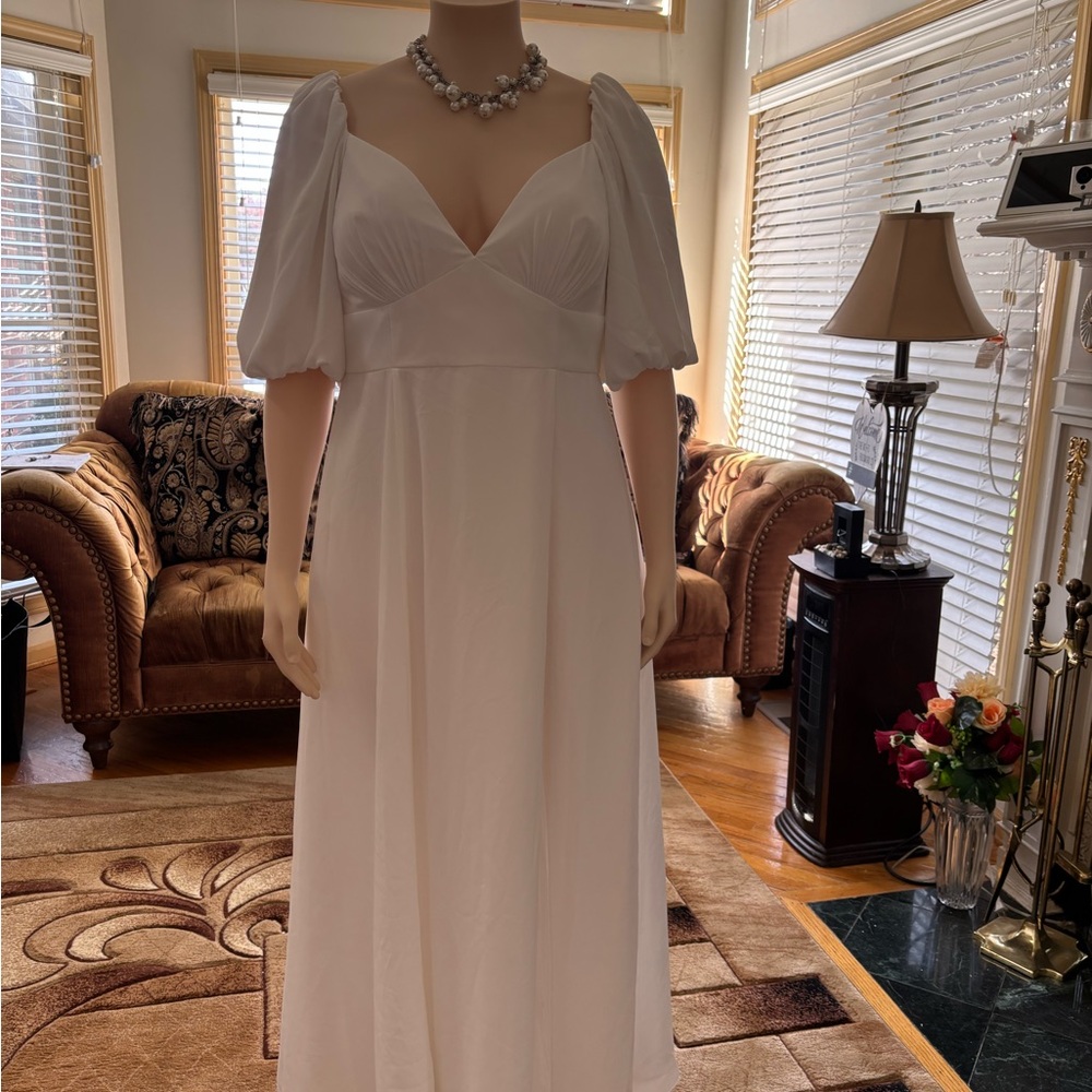 DB STUDIO
Bubble Sleeve Georgette V-Neck Wedding Dress
STYLE# SDWG0971. Size 16w - Picture 3 of 16